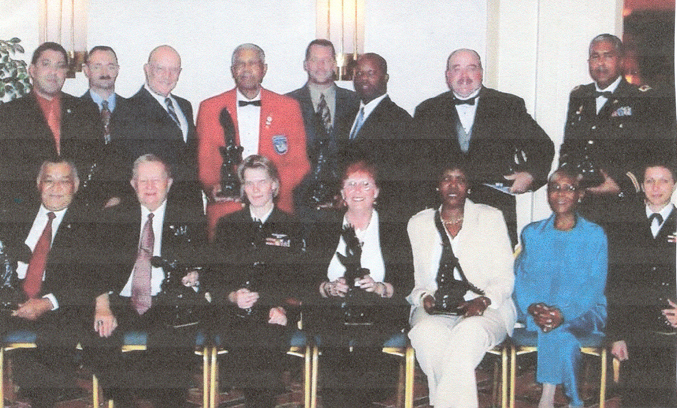 first row, 4th fm left Sharon Denitto; 2nd fm right Freddi E. Moody, President
back row, 2nd fm right Rob Roberts on behalf of John Devitt, President and Founder, Vietnam Combat Veterans Ltd., The Moving Wall, photograph from Freddi Moody